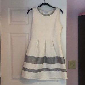 White and silver cocktail dress.